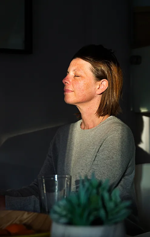Woman sitting quietly in thought
